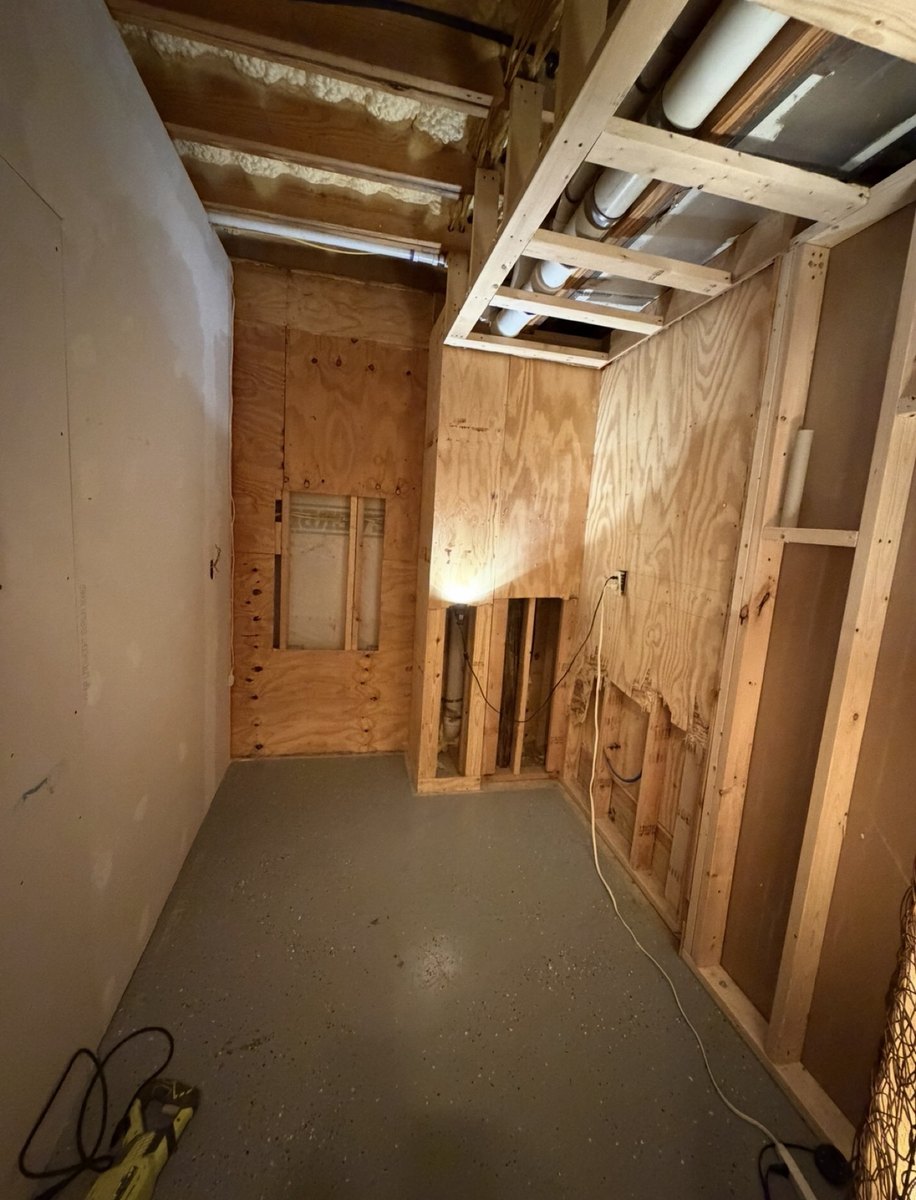 Before - unfinished space ready for custom playroom build