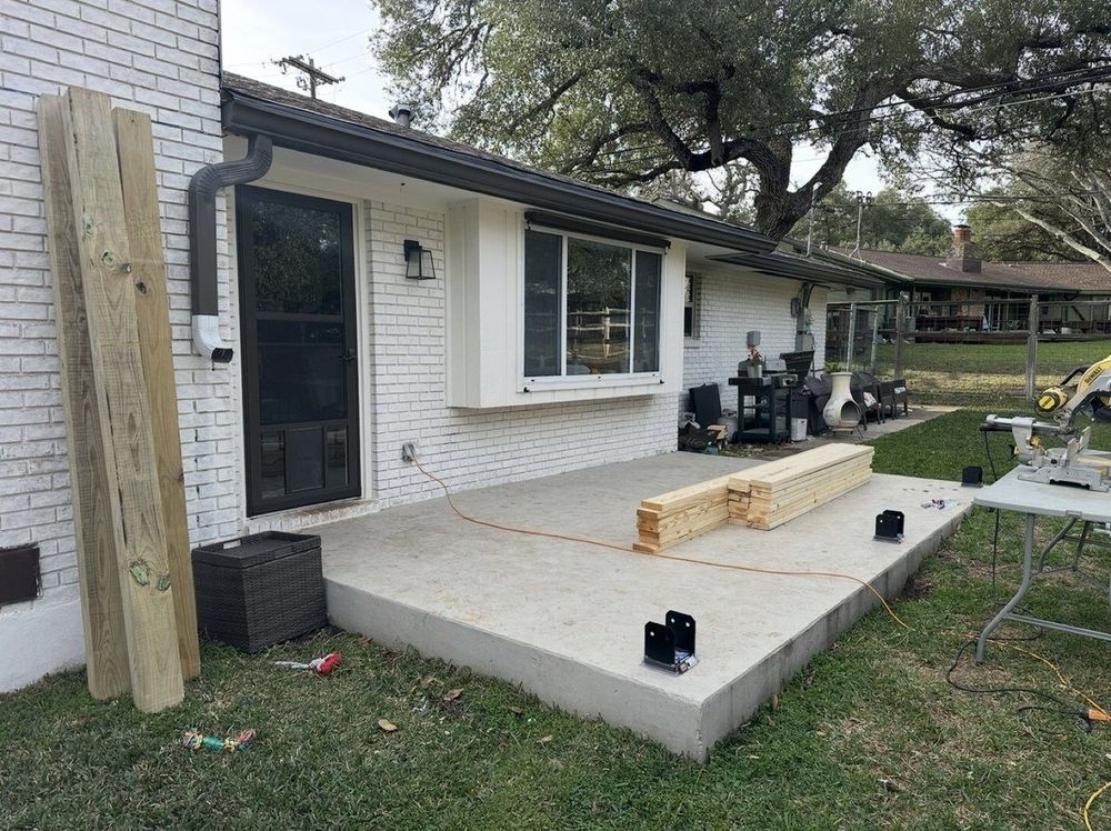 Before - open concrete patio slab before covered structure