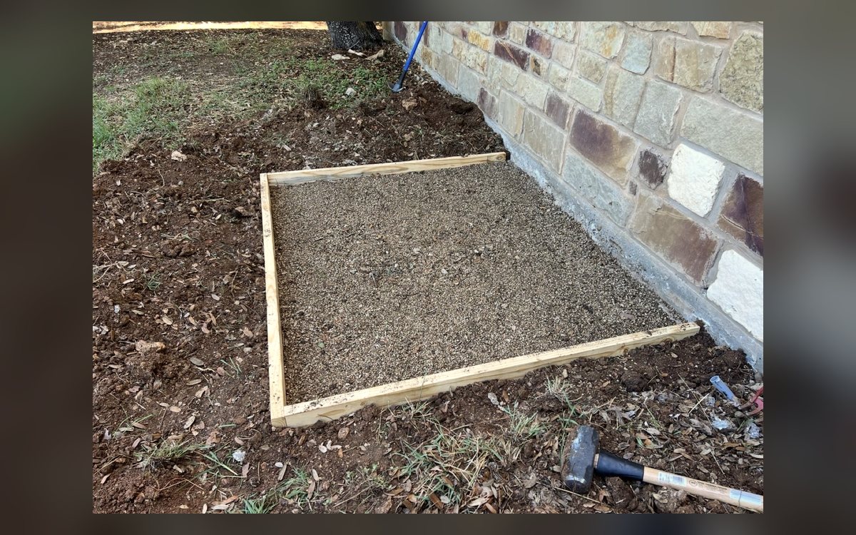 Before - gravel form prepared for outdoor shower concrete pad